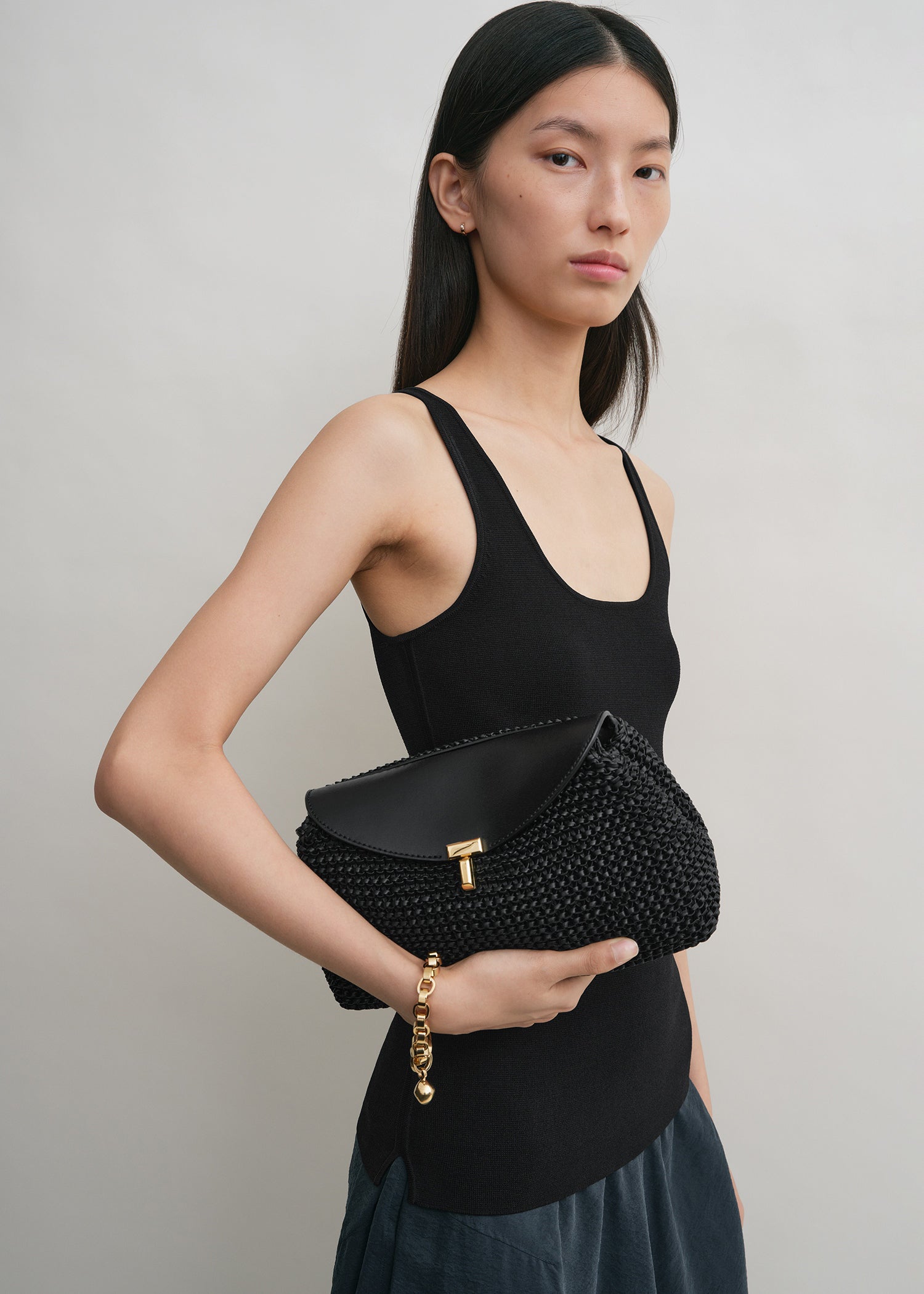 T-Lock woven-leather clutch black