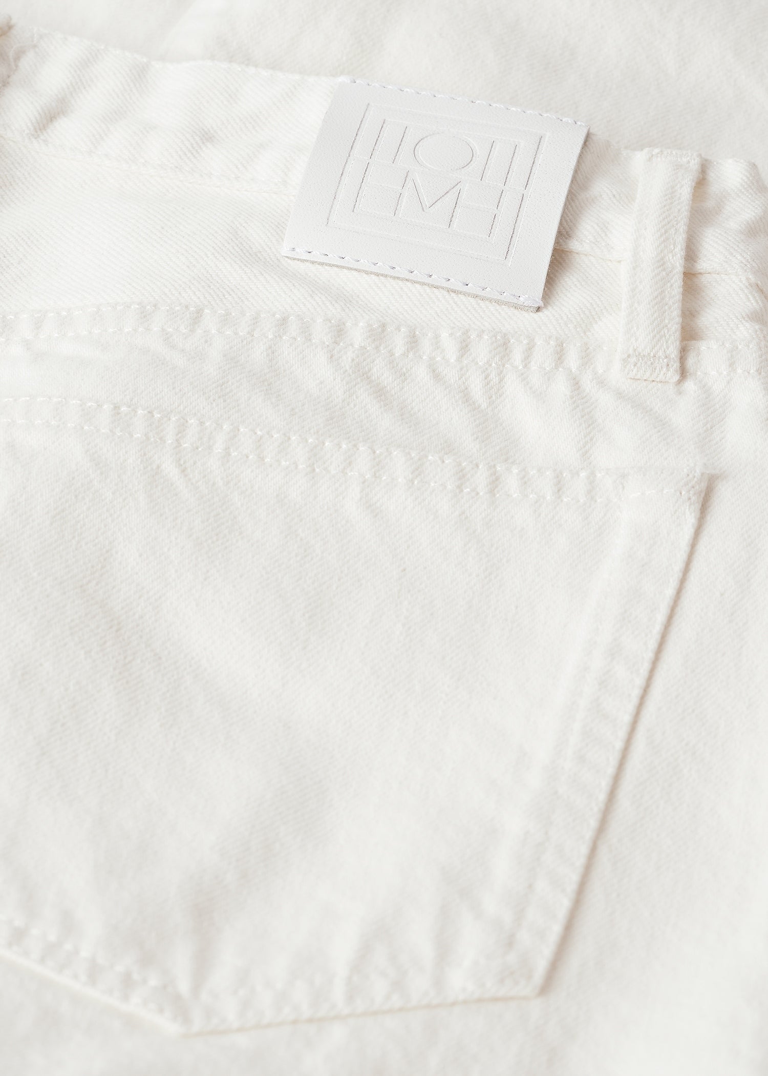 Twisted seam denim full length off-white