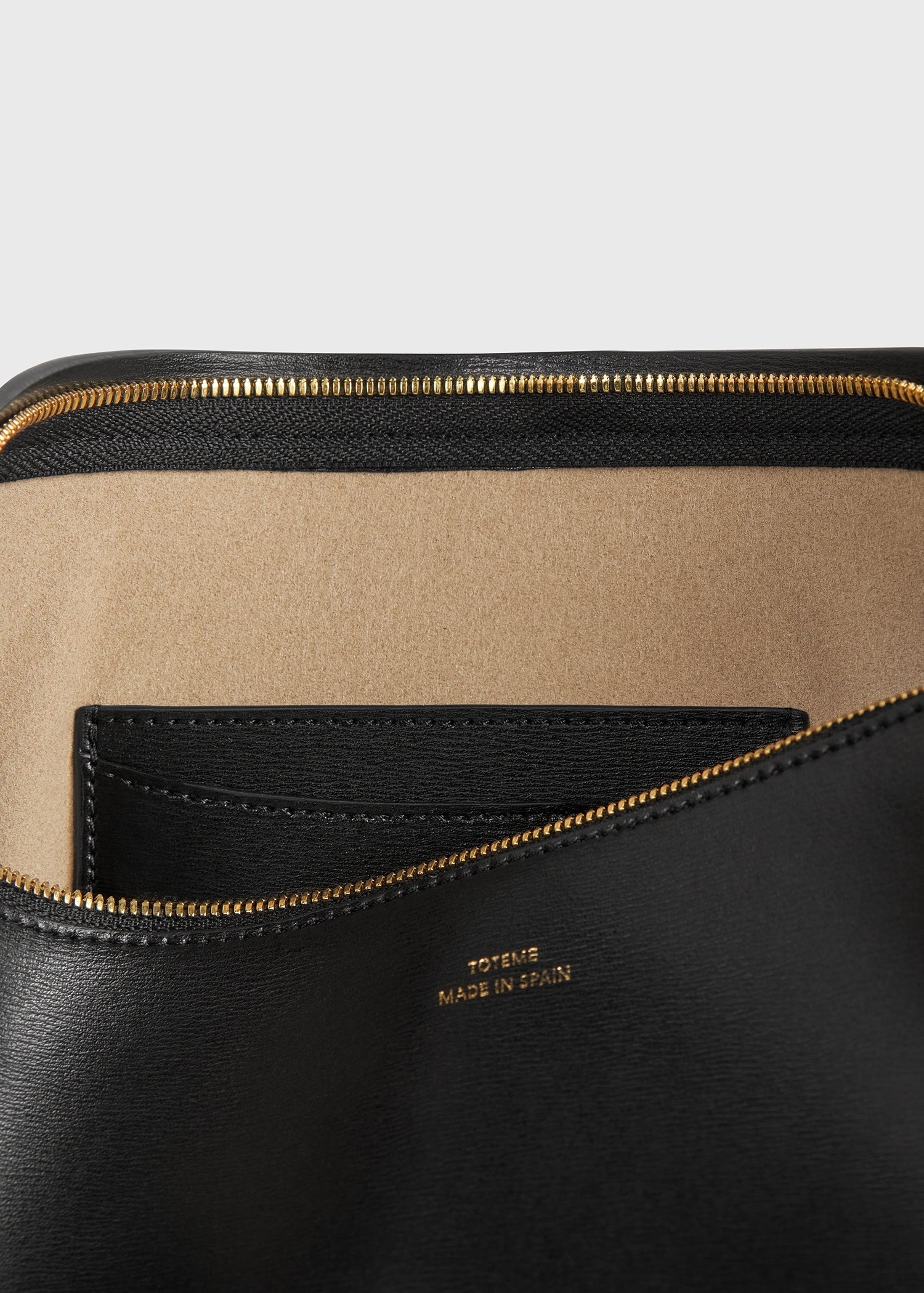 Leather scooped sling black